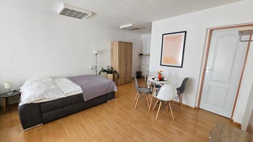 Ένα ή περισσότερα κρεβάτια σε δωμάτιο στο Apartmány v Zlatej uličke