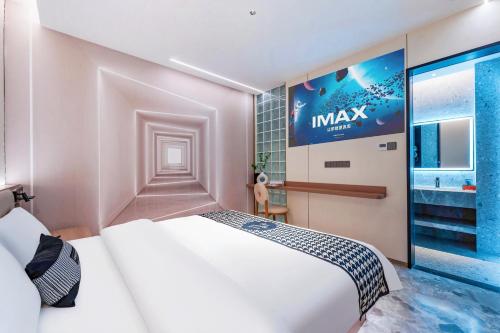 Katil atau katil-katil dalam bilik di Henghe Selected S-Design Hotel -Guangzhou Baiyun Railway Station International Garment City - Exhibition Trade Center Branch- Reputation Preferred