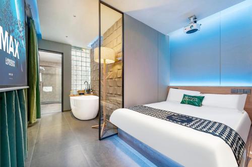Katil atau katil-katil dalam bilik di Henghe Selected S-Design Hotel -Guangzhou Baiyun Railway Station International Garment City - Exhibition Trade Center Branch- Reputation Preferred