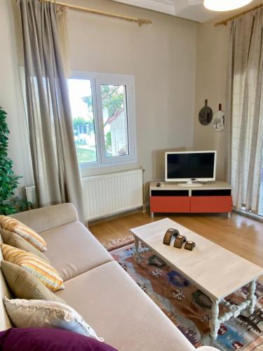 TV o dispositivi per l'intrattenimento presso Sunyear Guest Houses 2