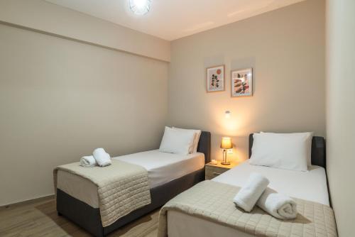 Кровать или кровати в номере Lilium Luxury Apartment