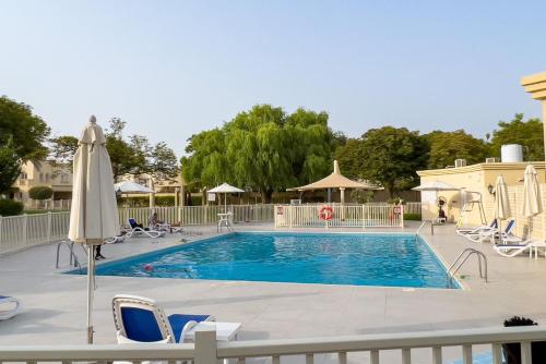 Bazén v ubytování GuestReady - Springs Serenity near Golf Club nebo v jeho okolí