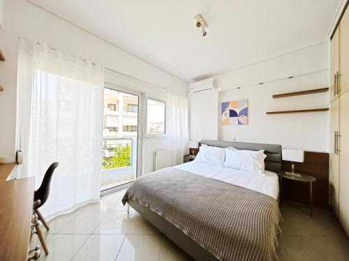 Ένα ή περισσότερα κρεβάτια σε δωμάτιο στο Olympus A1 - by Verde Apartments