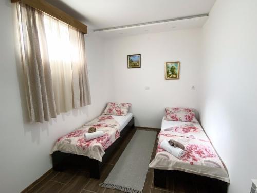 Tempat tidur dalam kamar di Smokvica