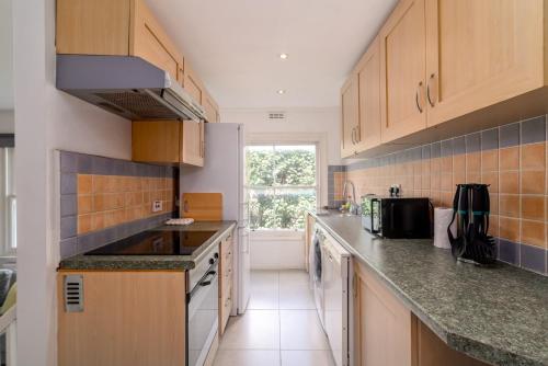 Una cocina o zona de cocina en GuestReady - Charming stay in Holland Park