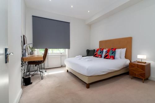 Cama o camas de una habitación en GuestReady - Charming stay in Holland Park