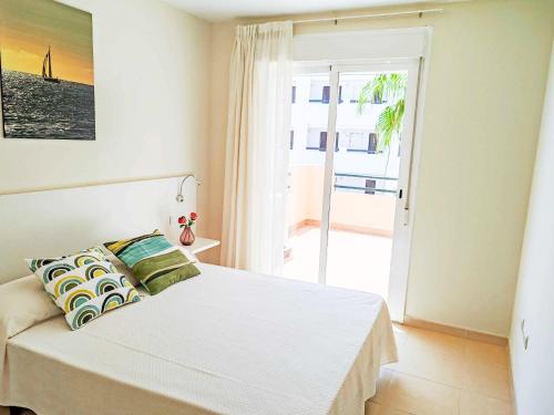 Postel nebo postele na pokoji v ubytování Asuncion Paraiso de Vera