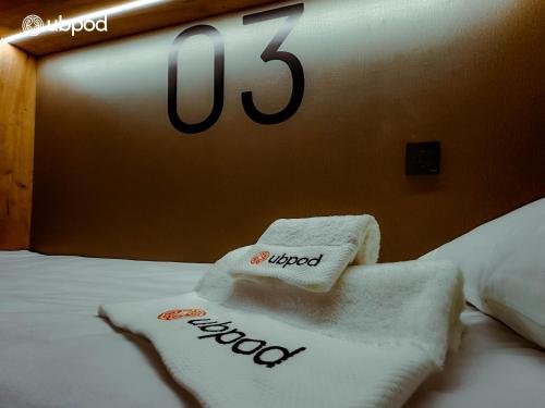 Postel nebo postele na pokoji v ubytování UBPOD- The First Capsule Hotel in Mongolia