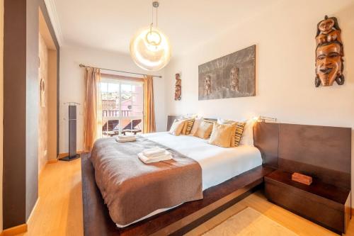 Postel nebo postele na pokoji v ubytování GuestReady - Spacious residence in Oeiras