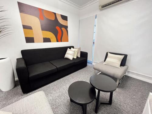 Zona de estar de Gladstone Gem 8 - Suva CBD 2 Bedroom Apartment
