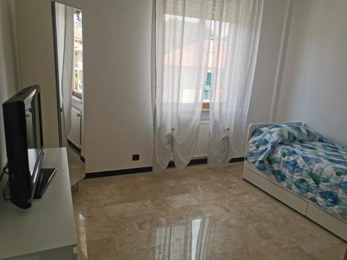 En eller flere senge i et værelse på Cenerina Home Due Mari