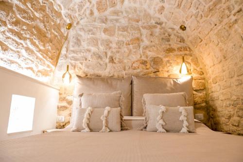 Postel nebo postele na pokoji v ubytování Fiscardi Room