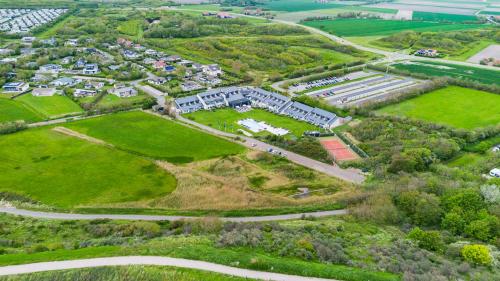 an aerial view of a large estate with a park at Fletcher Zuiderduin Beachhotel in Westkapelle