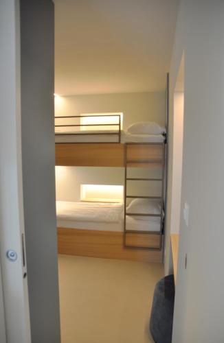 Postel nebo postele na pokoji v ubytování Boutique Hotel La Rocca