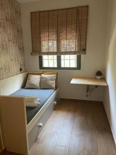 Postel nebo postele na pokoji v ubytování Casa rural Playa de Altomira
