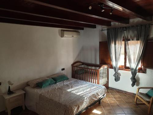 Postel nebo postele na pokoji v ubytování Nice Villa with private pool near Seville