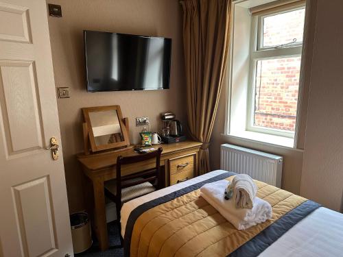 TV o dispositivi per l'intrattenimento presso The Chester Court Hotel