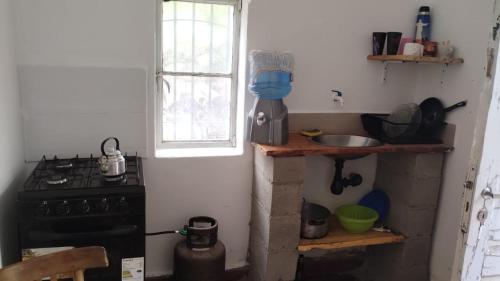 Virtuvė arba virtuvėlė apgyvendinimo įstaigoje Sol de la cumbre