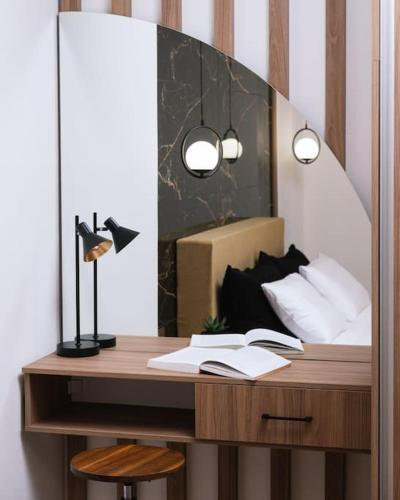 Ένα ή περισσότερα κρεβάτια σε δωμάτιο στο Green Apartment in the Hill