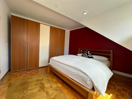 Ένα ή περισσότερα κρεβάτια σε δωμάτιο στο apartment11