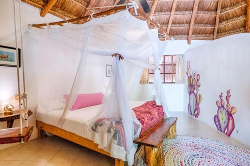 Llit o llits en una habitació de Villa Morena Boutique Hotel Ecoliving