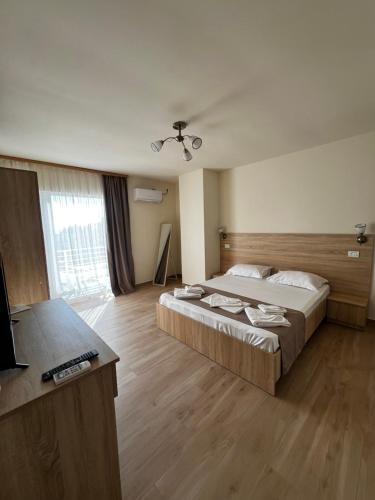 Postel nebo postele na pokoji v ubytování Vila Seimos