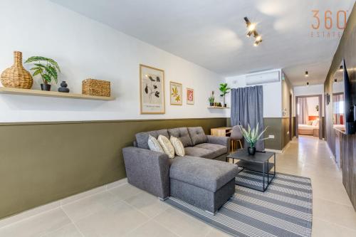 Coin salon dans l'établissement Urban Square Elite Suites by 360 Estates