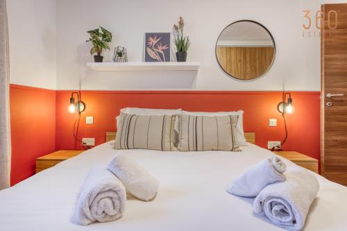 Un ou plusieurs lits dans un hébergement de l'établissement Urban Square Elite Suites by 360 Estates