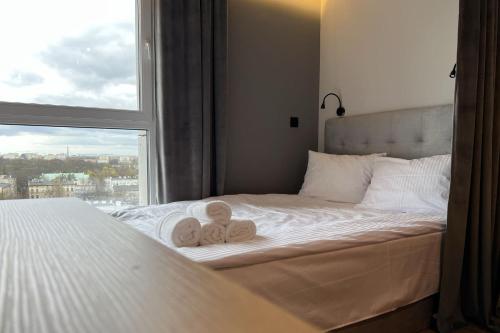 Кровать или кровати в номере Apartamenty Panorama