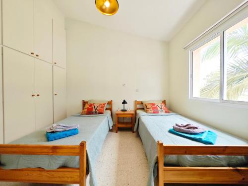 Postel nebo postele na pokoji v ubytování Villa Green Sea