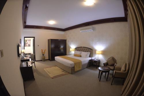 Postel nebo postele na pokoji v ubytování Verona Resorts Sharjah