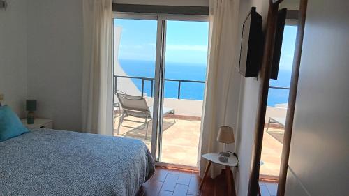 Posteľ alebo postele v izbe v ubytovaní Maravillosas vistas al Atlántico