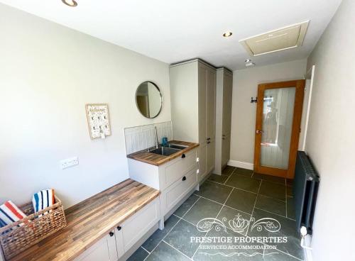 Kuchyň nebo kuchyňský kout v ubytování Millstream Barn by Prestige Properties SA