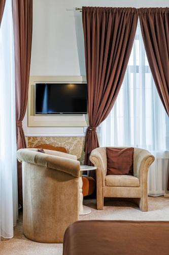 Гостиная зона в La Strada Boutique Villa