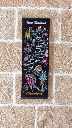 a sign hanging on a brick wall at Boutique B&B Número Cuatro in Benissa