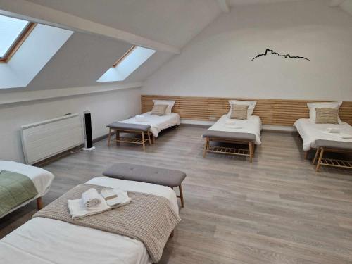 Postel nebo postele na pokoji v ubytování Coeur de Reigny