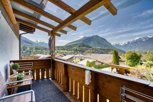 a balcony with a view of mountains at Apart Winkler in Karres