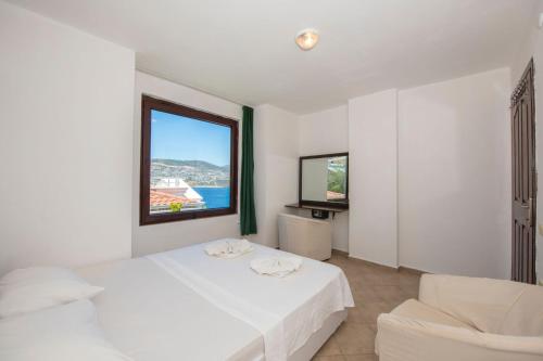 Ένα ή περισσότερα κρεβάτια σε δωμάτιο στο Villa Cemkan