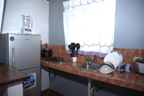 Kuchyň nebo kuchyňský kout v ubytování HOSPEDAJE VILLAMAR