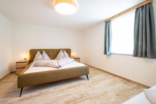 Ένα ή περισσότερα κρεβάτια σε δωμάτιο στο DoppelHerz