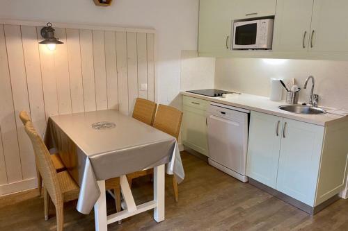 Dapur atau dapur kecil di Apartment in 4 residence with heated swimming pool parking