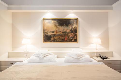 Ένα ή περισσότερα κρεβάτια σε δωμάτιο στο Hotel Elephant