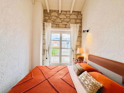 Postel nebo postele na pokoji v ubytování Alaçatı Köyiçi Agrilia House