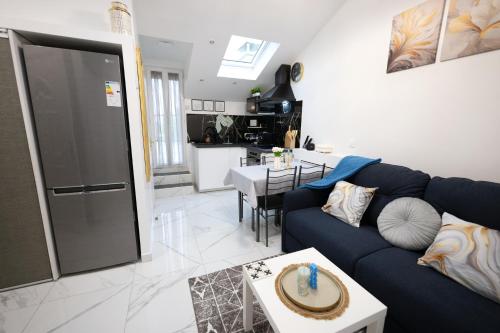 Kuchyň nebo kuchyňský kout v ubytování Appartement Royale 2 Pièces de 35 m2