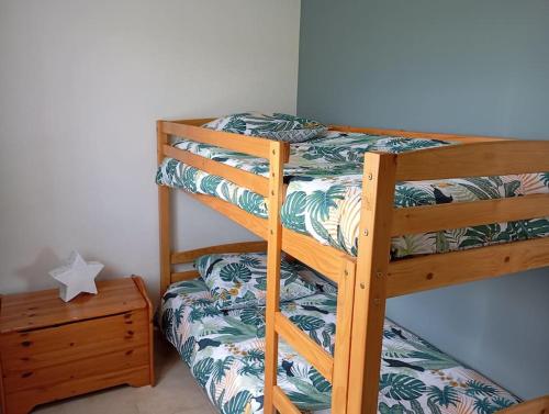 Postel nebo postele na pokoji v ubytování Maison 'La clé des champs'