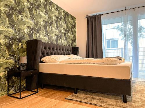 Llit o llits en una habitació de City Apartment Graz