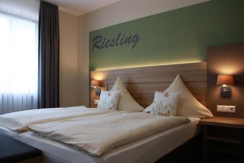 Cama o camas de una habitación en Weinhaus Gräfen