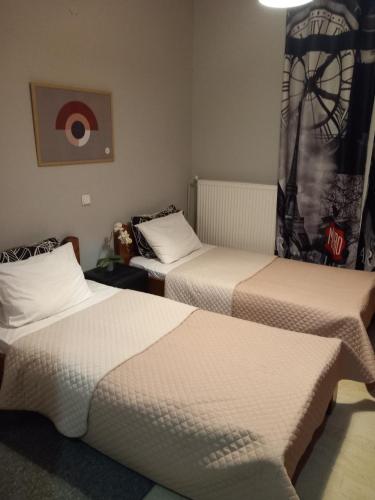 a room with two beds in a room at Dali sea view apartments in Zakynthos