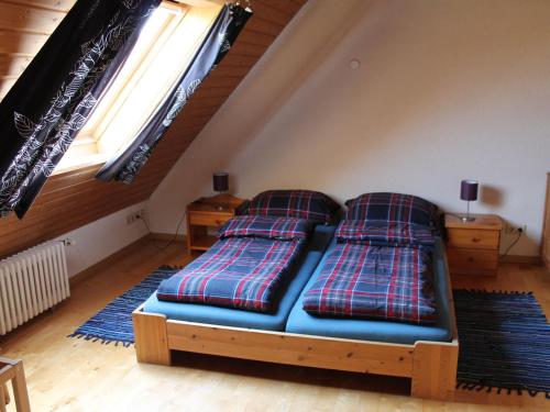 A bed or beds in a room at Appartement Lehen