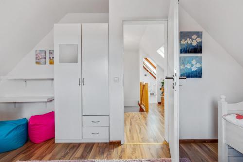 Postel nebo postele na pokoji v ubytování Ferienhaus Gisela in Holzstein an der Ostsee